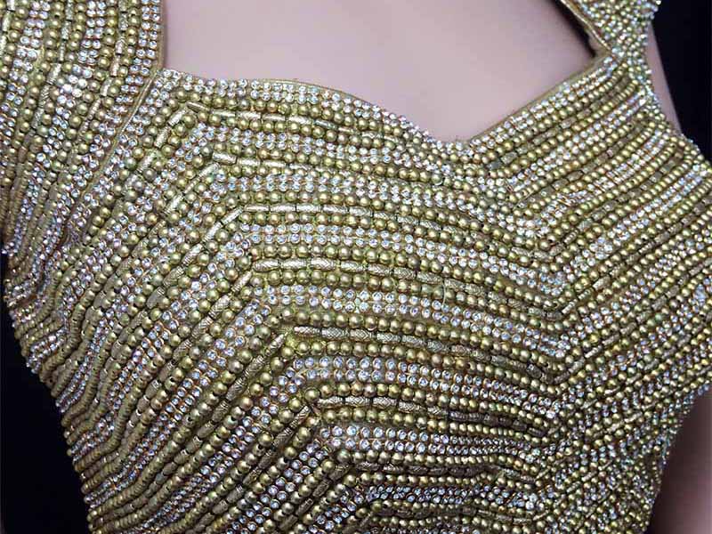 designer all beaded saree blouse woaman wearing all beaded saree blouse