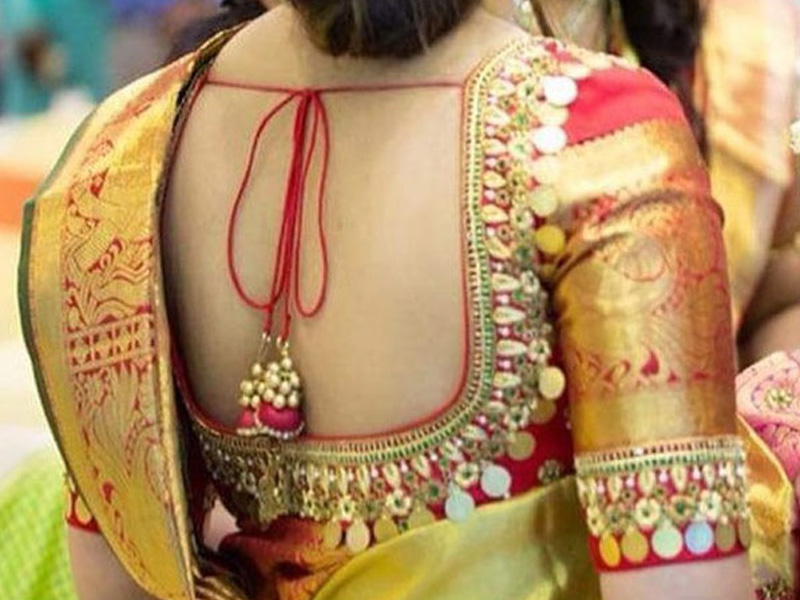 designer back embroidery saree blouse woaman wearing back embroidery saree blouse