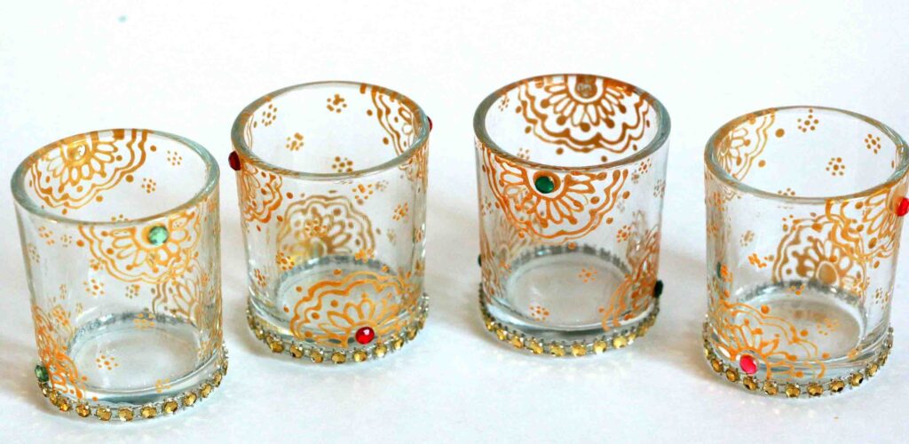 candles in a decorated glass candles in a decorated glass